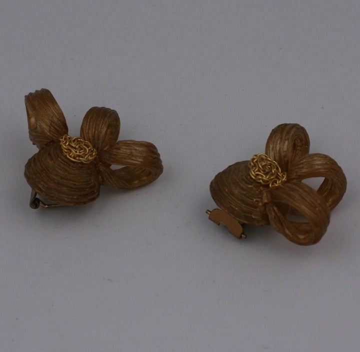 French Talosel Swirl Earclips from the 1940's. Talosel resin is worked almost like it was piped from a pastry tube with the addition of a coil of gilt metal chaining in each center. Clip back fittings, School of Line Vautrin, Paris,