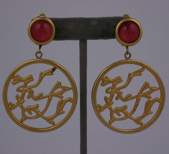 Karl Lagerfeld logo hoops earrings with branch like integrated logo suspended from a pate de verre cabochon. Clip back fittings. 1980's France. 3