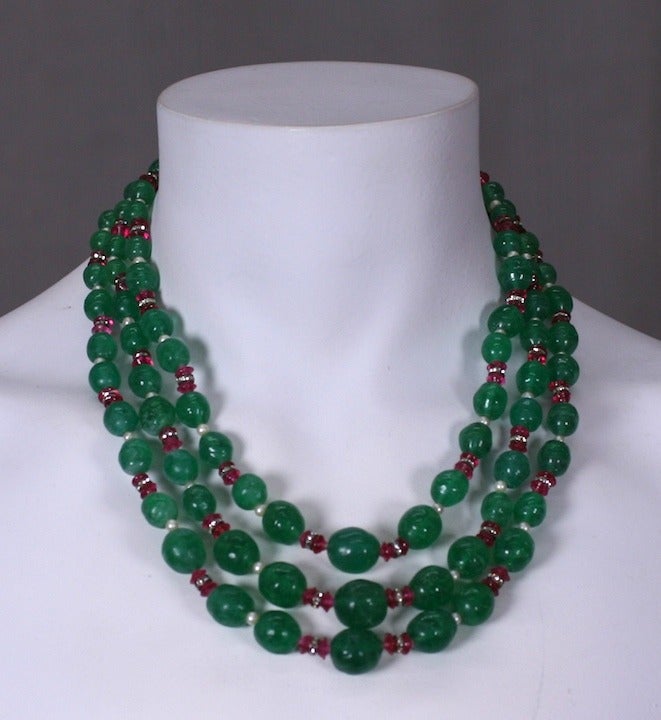Emerald Pate de Verre Suite with faux rubies and rondel pastes, 3 strands of graduated hand made French beads. Earrings have clip back fittings with long drops. Length: 16.5