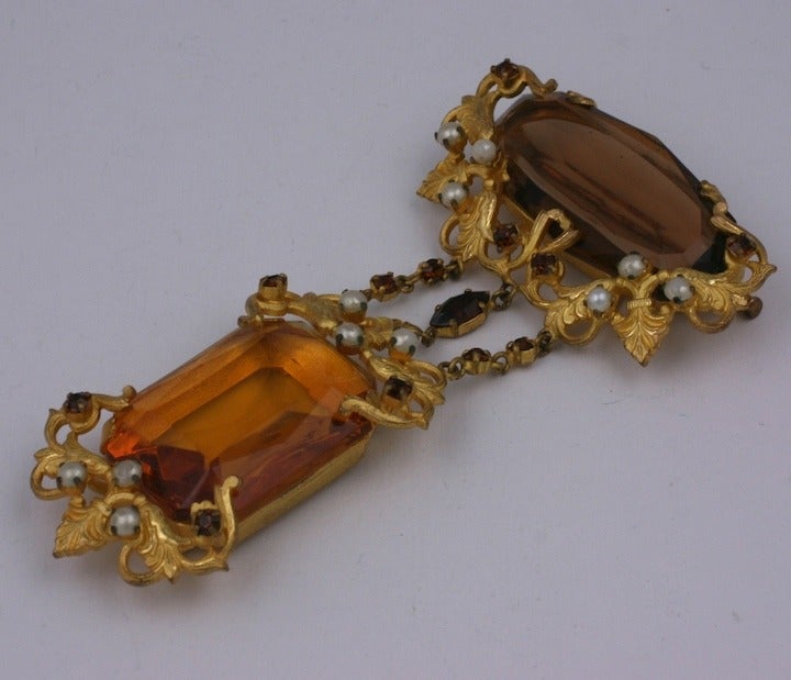  Roger Jean - Pierre Massive badge inspired articulated brooch of large elongated ovals, faux pearls and vari colored small set topaz crystals. Very baroque in feeling. France 1950's. Excellent condition.  4.25