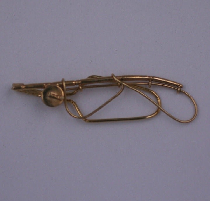 Fly fishing motif tie bar in 14k gold. Nice detail and finishing. 1940's USA.
Excellent condition.  2.25