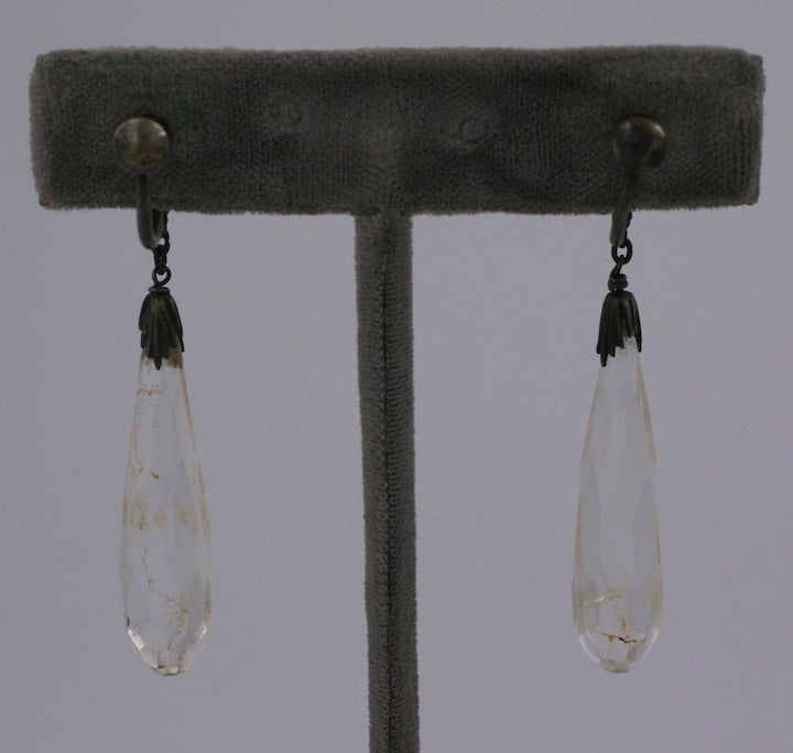 Art deco rock crystal flapper earrings with faceted drops. Set in silver. Made in China in the 1920's. Screw back fittings. 
Excellent condition. 2