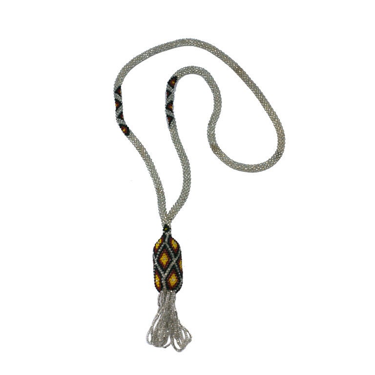 Flapper/1920's long silver plate necklace with black agate beads & tassel
