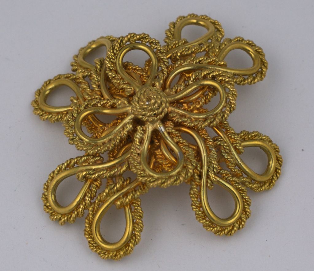 Attractive dimensional twisted gold wire crest brooch by K.J.L. circa 1960s.<br />
Excellent condition.<br />
3 x 3