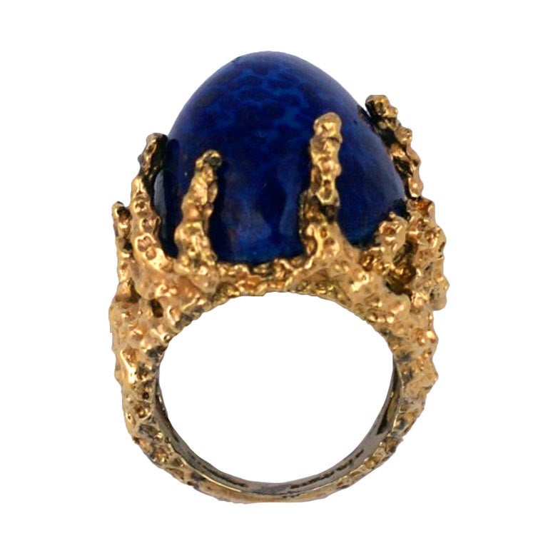 Abstract modernist gilt sterling ring with large bullet cab faux lapis poured glass stone. 1960's USA. 1.5