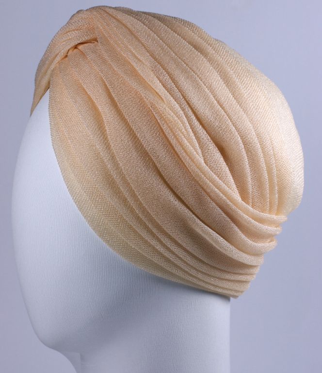 Blush draped silk jersey tulle turban by famed milliner Paulette.<br />
Made in France and retailed by Saks 5 Ave.<br />
23
