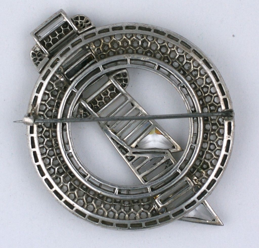 Magnificent art deco paste on sterling brooch circa 1930s. Typically deco design with large baguettes and unusually cut stones.Wonderful craftsmanship. <br />
Marked 