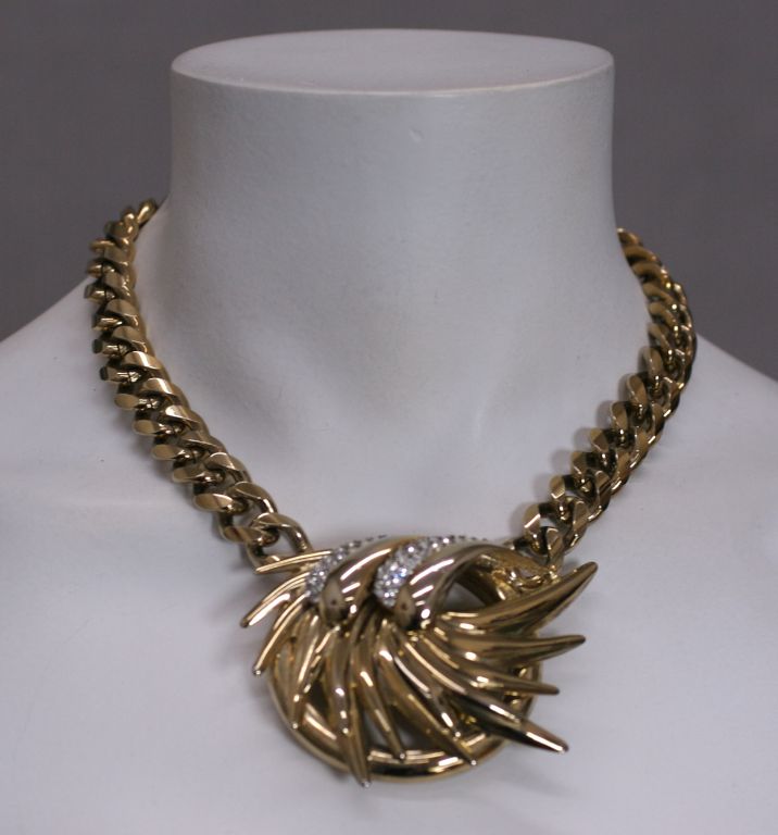 Gilt 1980s necklace with pave spiral spoke centerpiece.<br />
Chunky chain 16