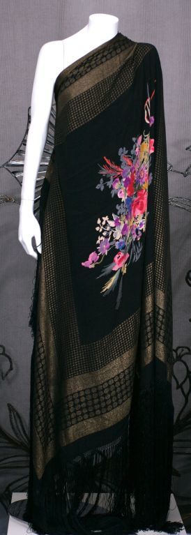 Rare fringed silk shawl of lame broche moderne borders with romantic printed floral bouquet center. 1930s France.<br />
48 x 48 plus fringe 20