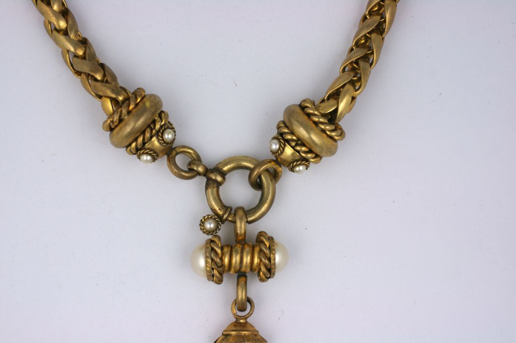 Oversized gilt brass French necklace from the 1980s. Thick wheat chain similar to those used by Chanel or Isabel Canovas forms the necklace and ends at a large 