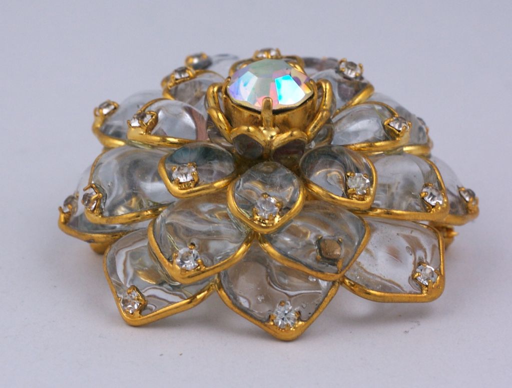 Handmade poured glass Zinnia brooch by Mark Walsh Leslie Chin. Crystal glass with pave accents at the tips of the petals.<br />
Has additional hook for pendant. Made in France.<br />
Images of Devon Aoiki in March ELLE.<br />
Excellent