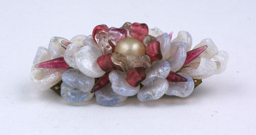 Louis Rousselet handmade opaline,ruby, and faux pearl flower form pate de verre brooch.<br />
Louis Rousselet (1892-1980) was born in Paris and apprenticed at the tender age of eight to M. Rousseau to master the technique of lamp-work beads.