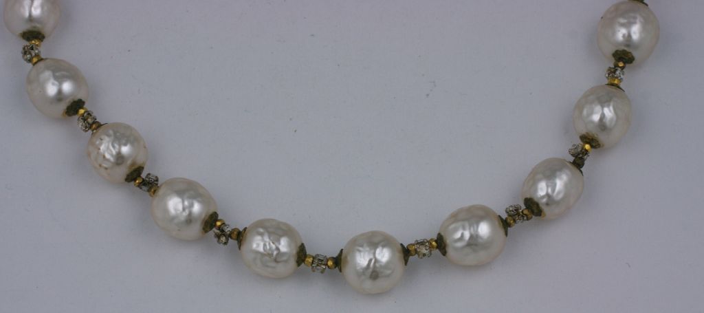 Miriam Haskell signature, gilt , baroque pearl necklace with rose monte spacers