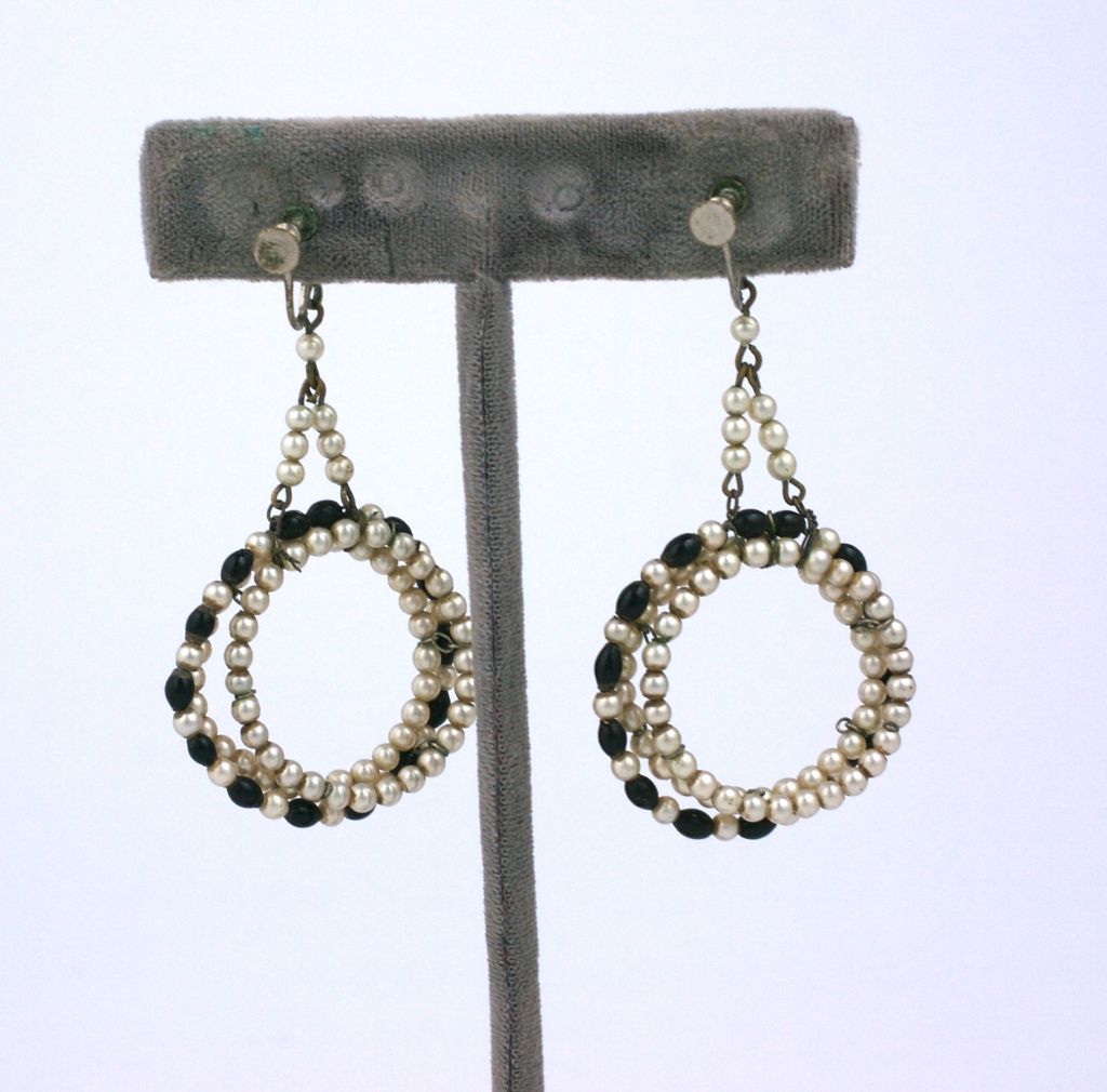 Louis Rousselet,art deco handmade faux onyx and  faux pearl dangle hoop earrings.<br />
Louis Rousselet (1892-1980) was born in Paris and apprenticed at the tender age of eight to M. Rousseau to master the technique of lamp-work beads. "Before