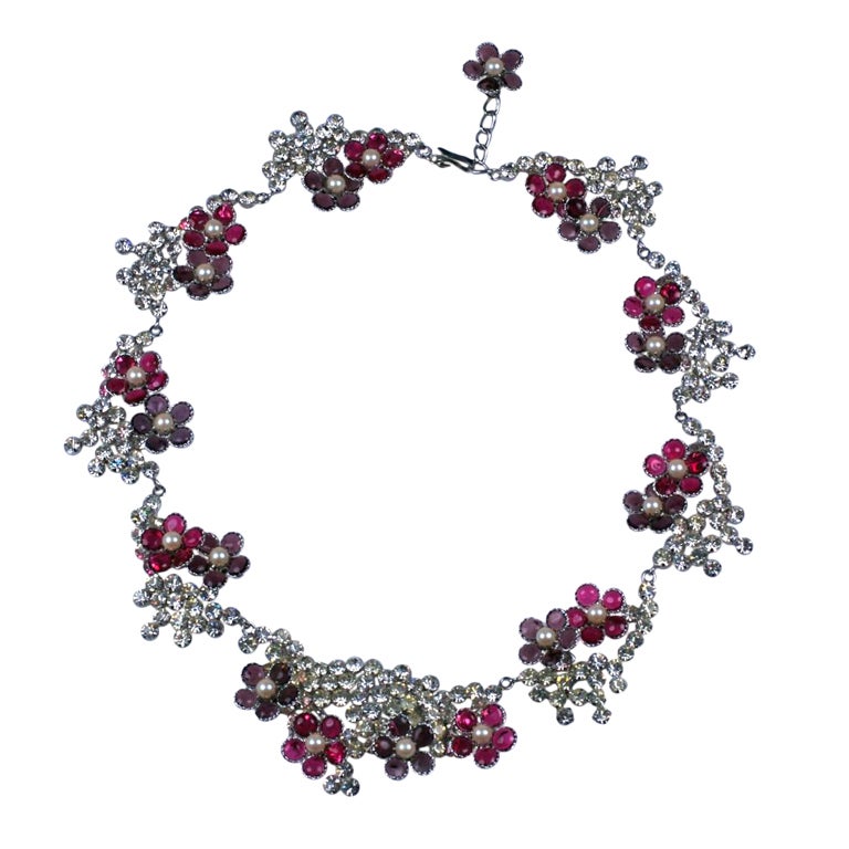 Unusual and rare Maison Gripoix necklace with poured glass enamel flowers in amythest and ruby Gripoix  glass, with hand  prong set swarovski crystal links.  1950's France. 16.5