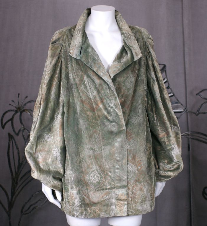 Maria Monica Gallenga silk velvet jacket in seafoam green with silver gilt and gold printed decoration. Baroque printed pattern printed in layers for depth.<br />
Jacket has a full cut with one self fabric button closure at neck and overlapping