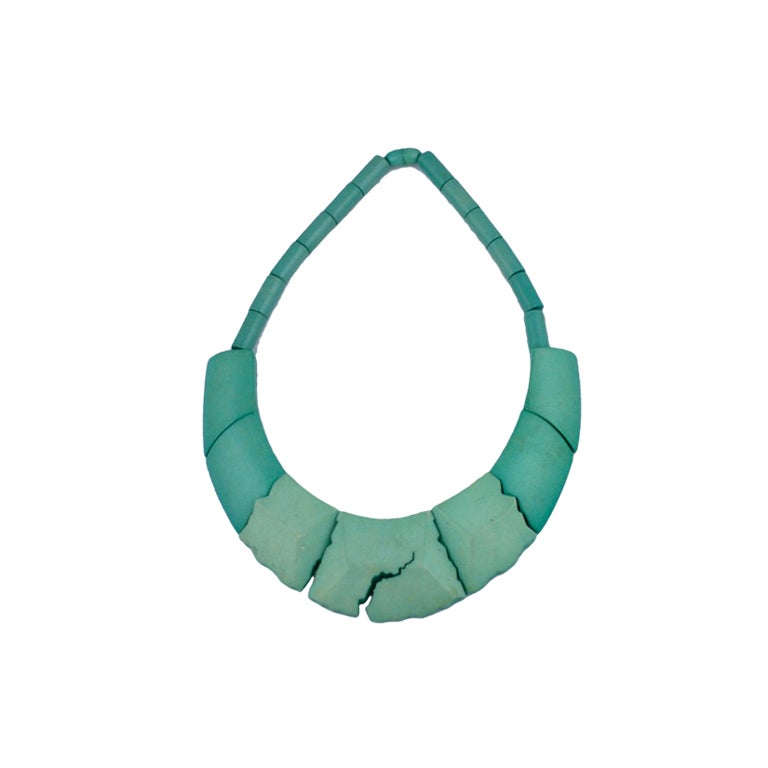 Turquoise patinaed Galalith with Memphis styled overtones from the 1970's Paris.  

François Schoenlaub set up the company GUILLEMETTE L'HOIR - PARIS when he first discovered Galalith (or French bakelite ) in 1976. 
He designed and produced his