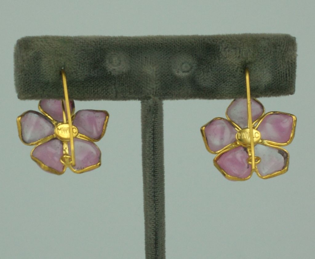 Handmade pale pink poured glass flower earrings from the 
