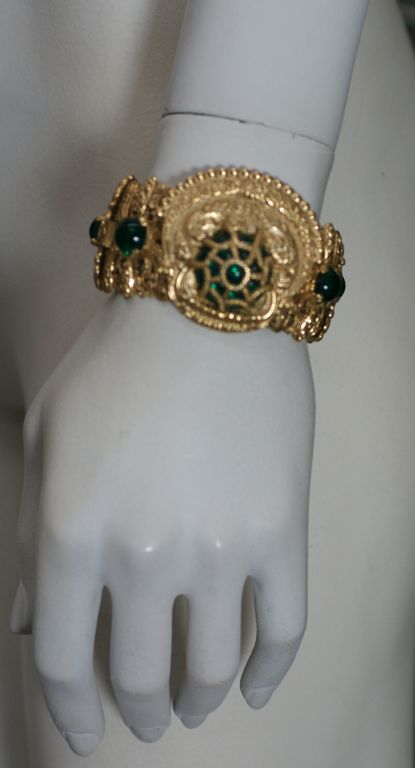 Napier Moghul inspired gilt and faux emerald link bracelet.Ornate links set with cabochon 