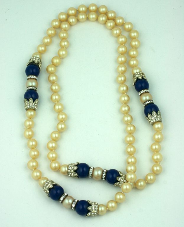 Long Pearls attributed to KJL with pave rhinestone stations and faux lapis poured glass spacers. Excellent quality with hand knotted pearls.  40