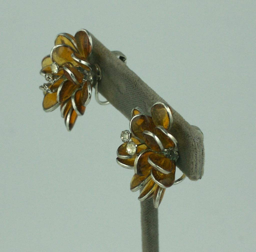 Poured citrine glass petal earrings from the 1950s. Clip back fittings with rhinestone centers. 1.25