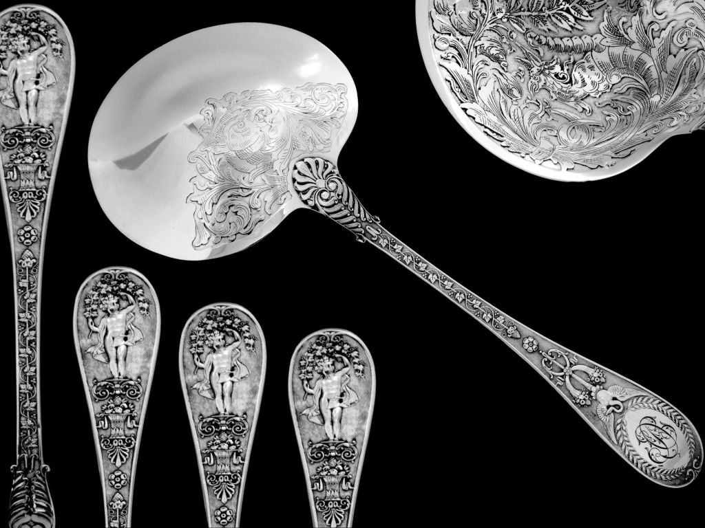 QUEILLE Rare French All Sterling Silver Strawberry Spoon Swan,Cornucopia, Putti

Head of Minerve 1 st titre for 950/1000 French Sterling Silver guarantee

A rare strawberry spoon of truly exceptional quality, for the richness of Neo classical