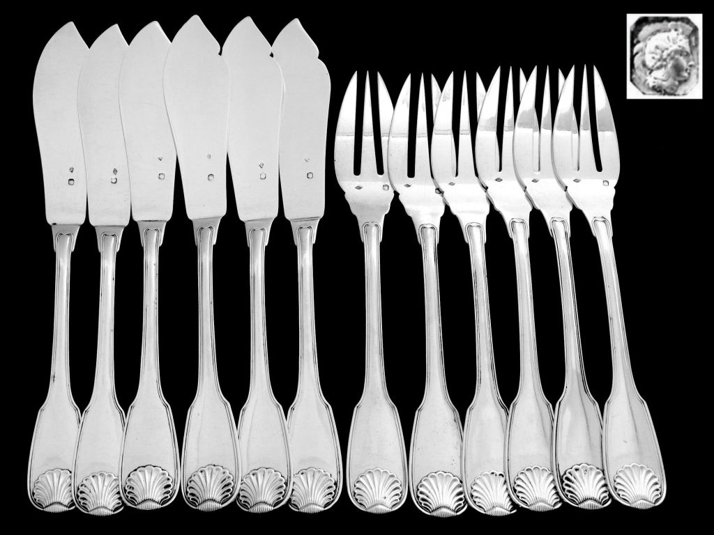 Fabulous french sterling silver fish flatware 12 pc with shell and Crown baron pattern on the handles. No initials or monograms. 

Exceptional in both design and execution, this fabulous set will grace your table and will delight your guests. 