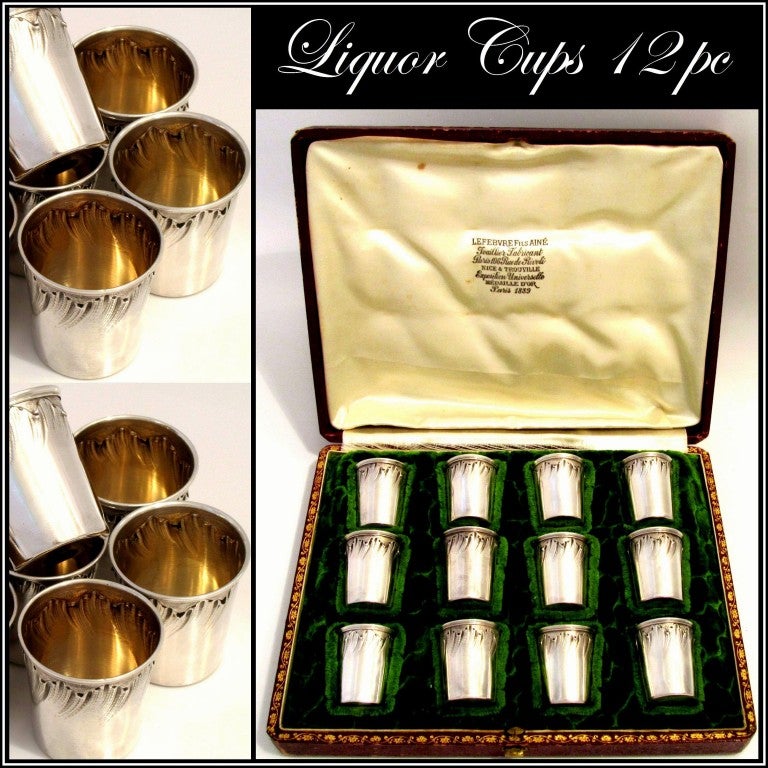 Gorgeous French Sterling Silver Vermeil Liquor Cups 12 pc w/original box Rococo 

This set is an exceptional example of the very developed Rococo style seen throughout the second half of the XIXth century. Very high quality work. The set is
