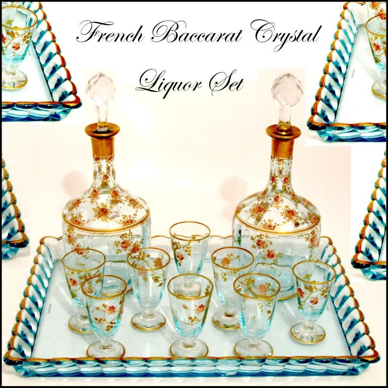 1900's BACCARAT French Enameled Liqueur Set, Decanter Pair, Cordials &Tray Roses

Exceptional and antique French Baccarat enameled crystal liquor or aperitif service, Circa 1900. Comprising of two decanters, 8 cordial glasses and tray. The amazing