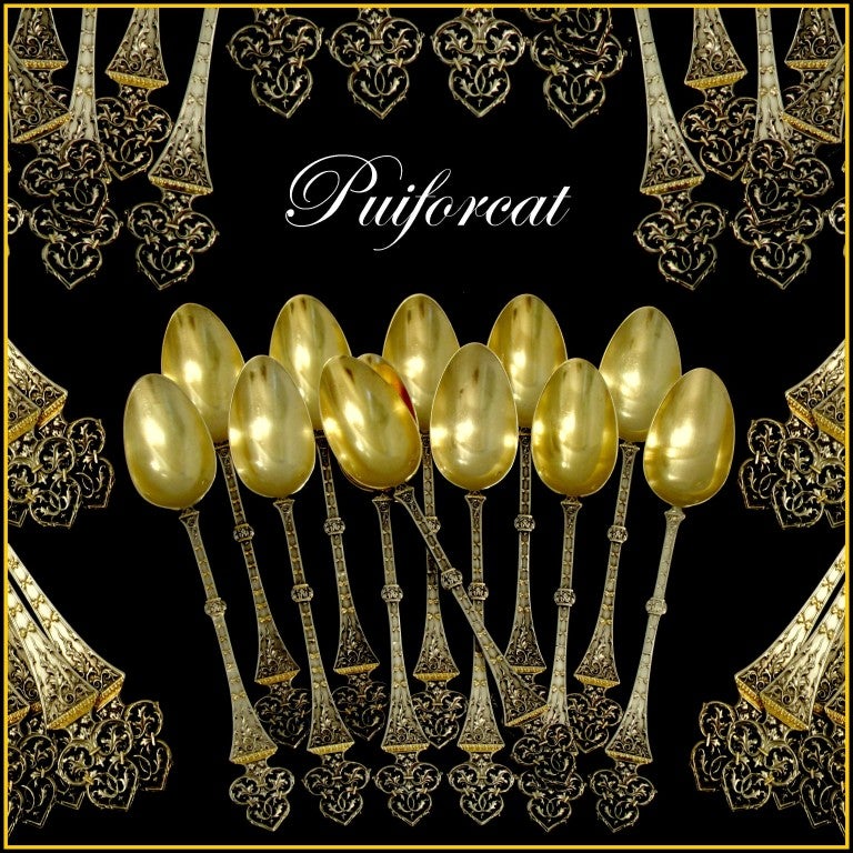 PUIFORCAT Rare French Sterling Silver Vermeil Dessert Spoons Set 12 pc Trilobé

A set of truly exceptional quality, for the richness of their decoration, not only for their form and sculpting, but also for the multi-coloured which is itself quite