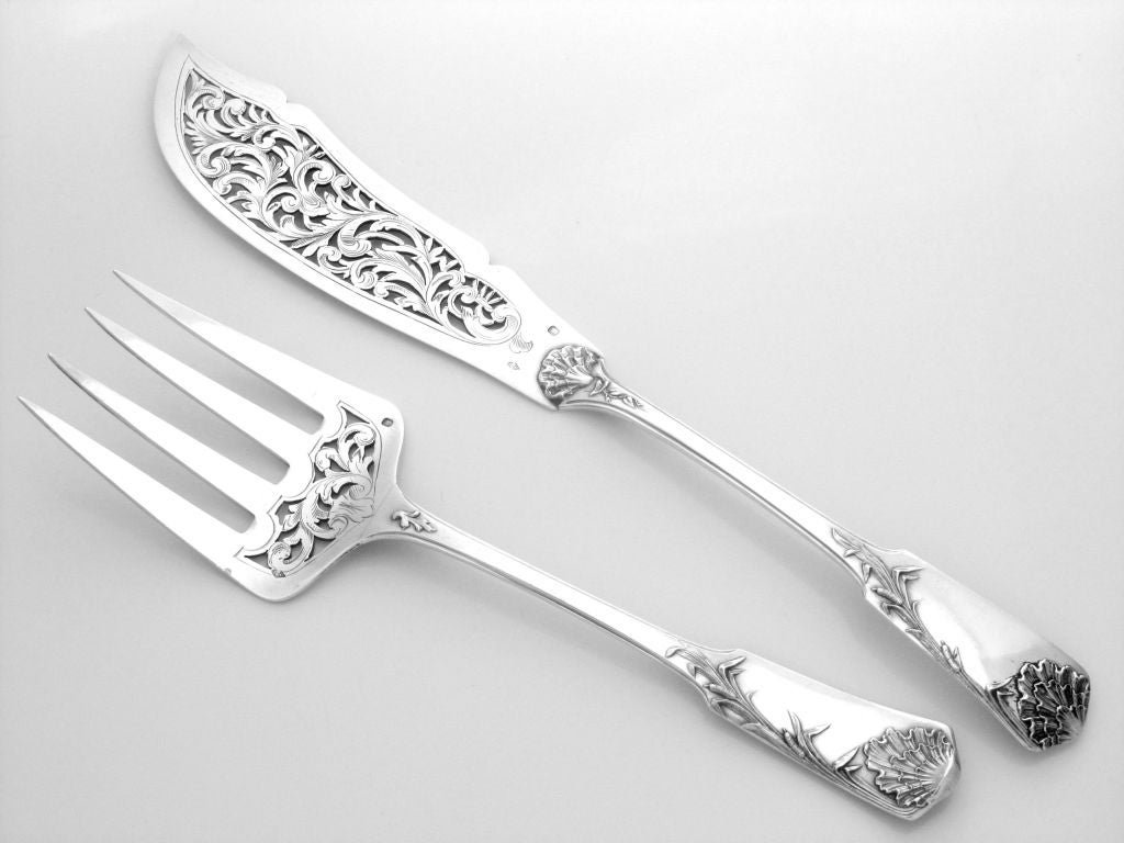 GRANDVIGNE Fabulous French All Sterling Silver Fish Servers 2 pc Reeds Motifs

The design and workmanship of this set is exceptional. Fantastic Fish Servers, the upper parts are engraved on both sides and pierced with foliage decoration. The