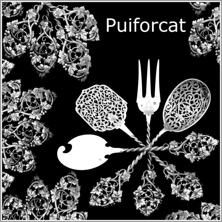 PUIFORCAT French All Sterling Silver Hors D'oeuvre Set 4 pc w/box Vine leaves

A set of truly exceptional quality, for the richness of its decoration, its form and sculpting. The set includes a knife-shaped ax, a pierced server, a fork & pierced