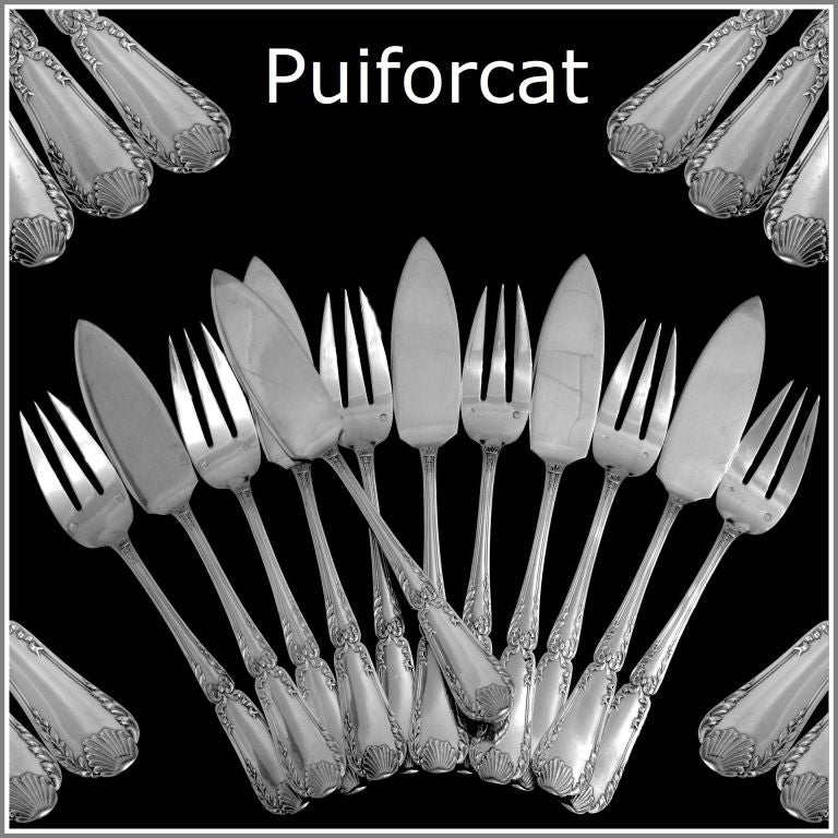 PUIFORCAT Rare French Sterling Silver Fish Flatware 12 pc Pompadour, Louis XVI pattern

A rare fish flatware with foliate, shell and ribbon decoration. No monogrammed. There are plate of the Maison Puiforcat catalogue, and is called 