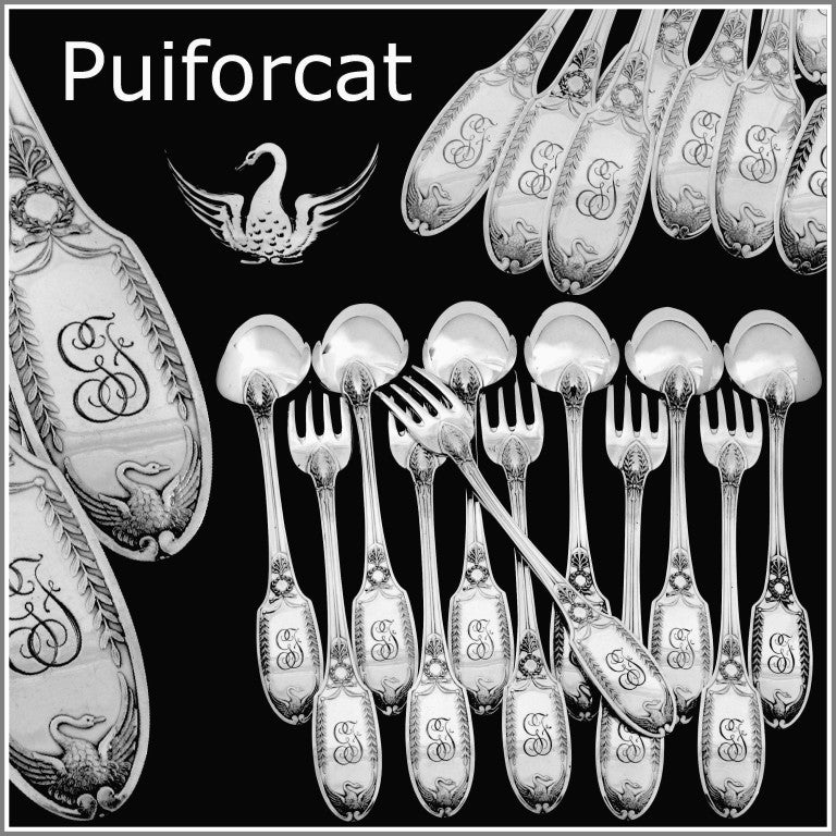 PUIFORCAT Rare French Sterling Silver Dinner Flatware Set 12 pc Swans

Exceptional French sterling silver Dinner Flatware 12 pc Empire style, the fabulous model with spatulas are carved on both sides of Swan with outspread wings. Beautiful