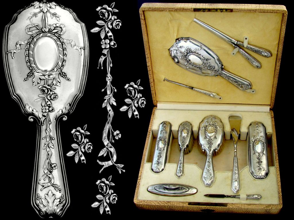 Rare French Sterling Silver Travel Vanity Set 10 pc w/Original Case Louis XVI pattern

Exceptional and rare Travel Vanity Set 10 pieces in sterling silver, including a hand mirror, a laces Hook with steel hook, a clip to relax the gloves, a brush