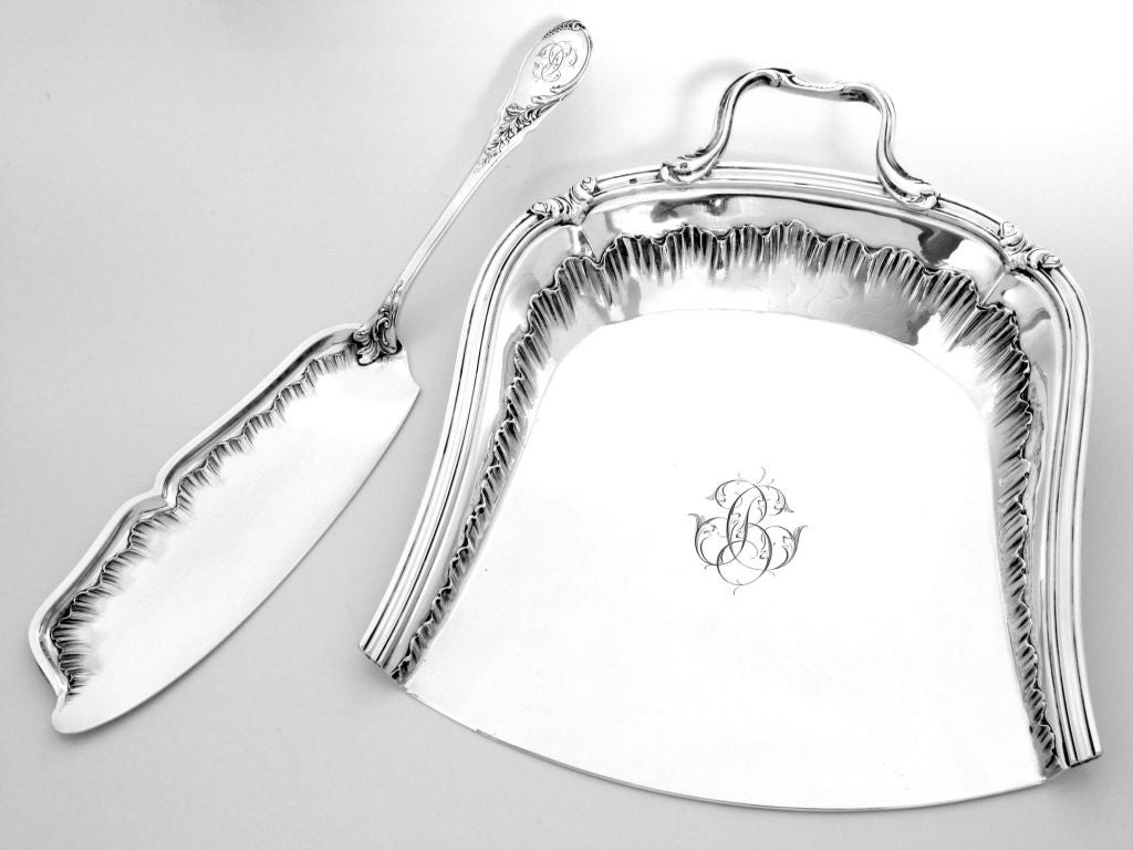 HENIN Rare & Heavy French All Sterling Silver Crumb Tray Service 2 pc Rococo 

Louis XV, Rococo style inspiration for this crumb tray service with foliate decoration. The crumb scoop was designed with a raised edge for easy transport and cleaning