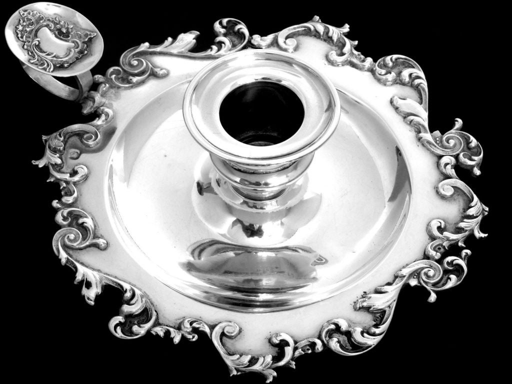 Gorgeous Antique French sterling silver candle holder of exaggerated Rococo style. Finesse of design and quality of execution. No monogrammed. 

Hallmarks :
Head of Minerve 1 st titre for 950/1000 French Sterling Silver guarantee.

Measures