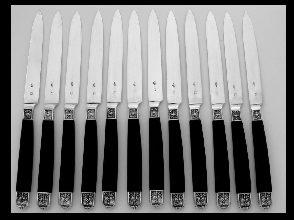 Fabulous French Sterling Silver Dessert/Entremet/Cheese/Salad Knife set 12 pc with Ebony handles, Sterling Silver blades, ferrules & collars. Style blades allow certify the period of manufacture of these knives at the beginning of the 19th century.