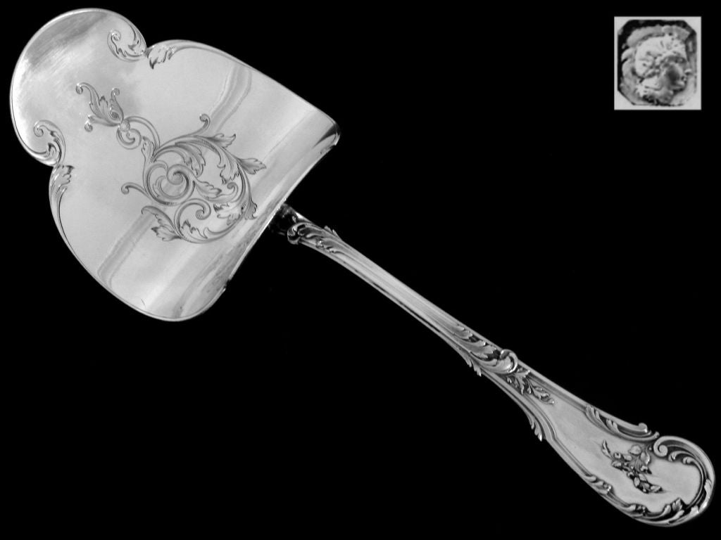 Exceptional Asparagus/Pastry server in sterling silver. The sophistication of this design and the quality of workmanship is typical of that of the Maison Cardeilhac. The curved blade has engraved with foliate decoration. An architectural fantasy
