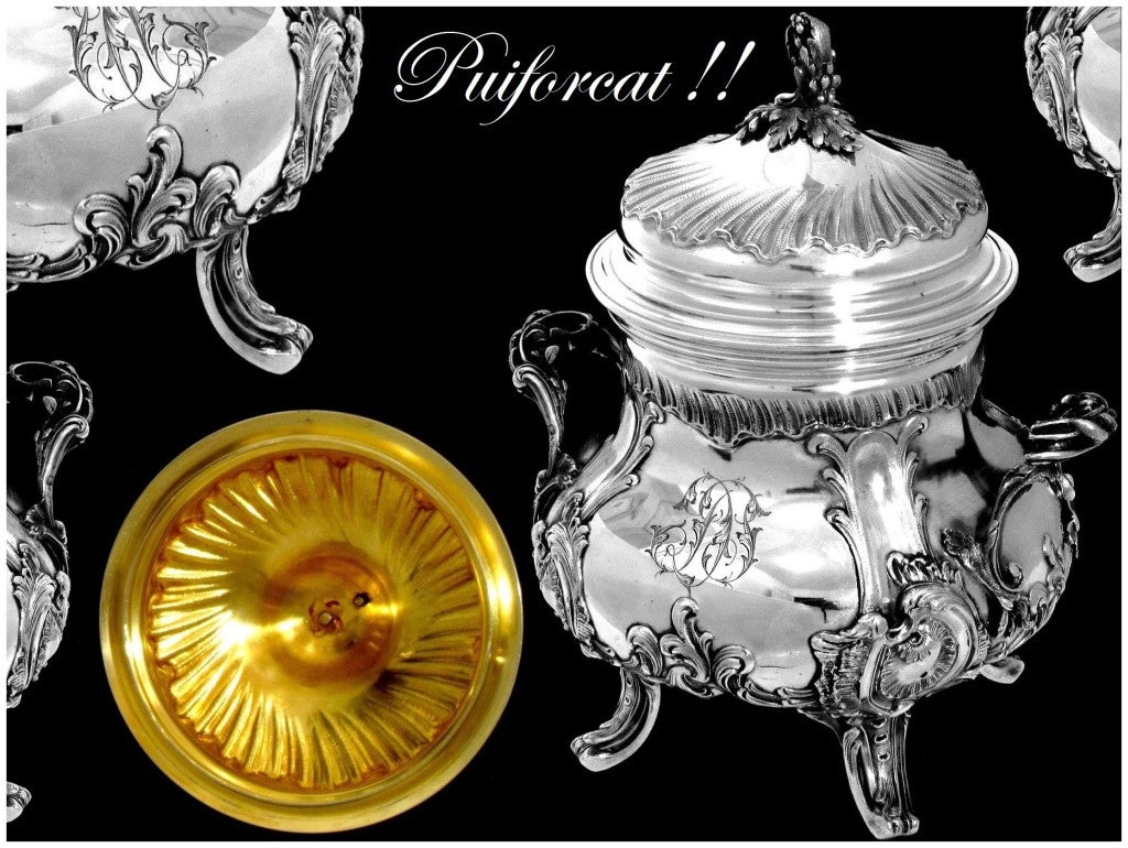 Puiforcat Imposing French Sterling Silver Vermeil Sugar Bowl Rococo 616 grams

This sugar bowl is an exceptional example of the very developed Rococo style seen throughout the second half of the XIXth century. Finesse of design and quality of