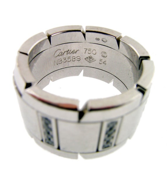 18KT white gold diamond Tank Française ring by Cartier containing .38 cts high quality diamonds. Measures size 6.25.