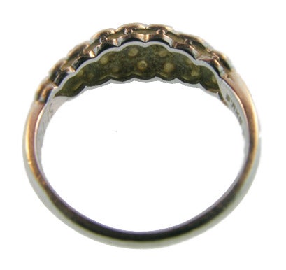 A Birks ring featuring 28 bead set diamonds .42 cts. F-G and VS quality, set in platinum. Measures size 5.5