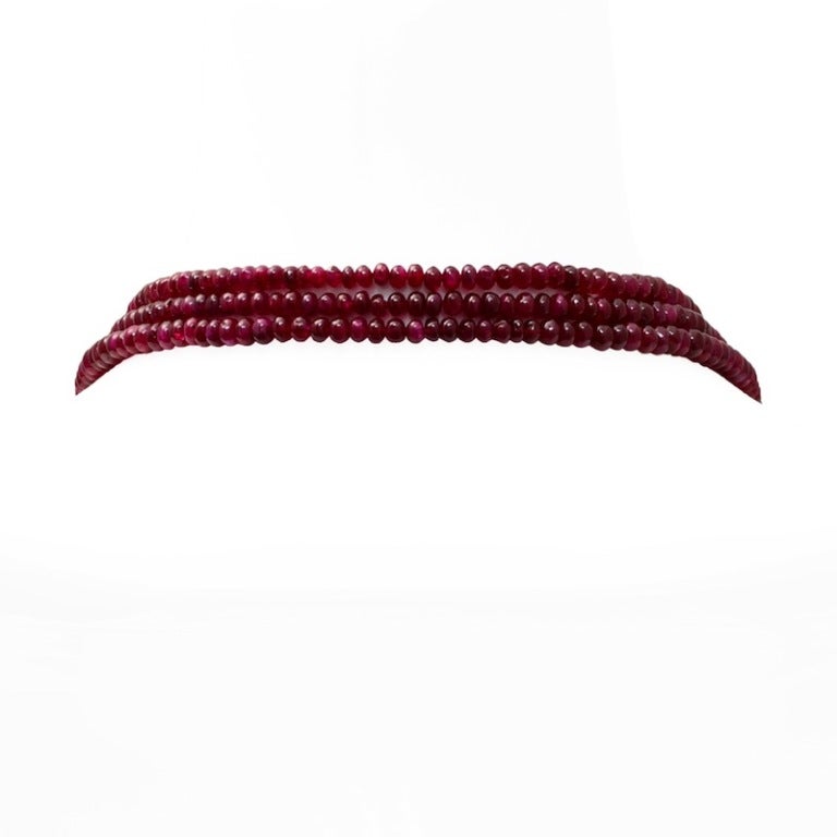An important collection of burmese (no heat) ruby beads necklace with a diamond clasp. The ruby beads weigh a total of 927.26 carats and accompany a gemological report from AGL stating the country-of-origin as Burma (Myanmar) with No Enhancement.