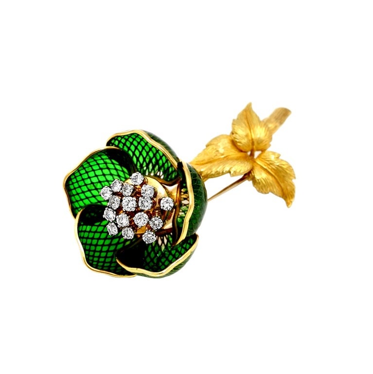 Articulately crafted Green Enamel and Diamond Flower Brooch, where each petal aesthetically crafted with gold and green enamel as well numbered in roman numbers from I, II, III, IV, and V. French Hallmarks, Stamped "Made in France",