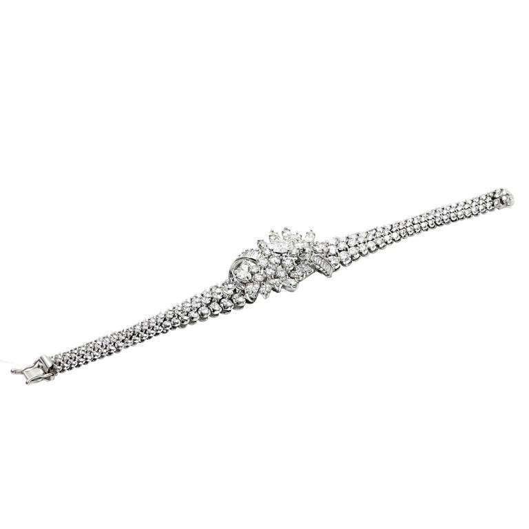 An elegant diamond bracelet having a marquise diamond weighing approximately 1.10 carat (Est G-SI2), accented by 14 marquise cut diamonds totaling approximately 4.70 carat (Est. G-VVS2), 160 brilliant cut diamonds totaling 17.89 carat (G-VVS2) along