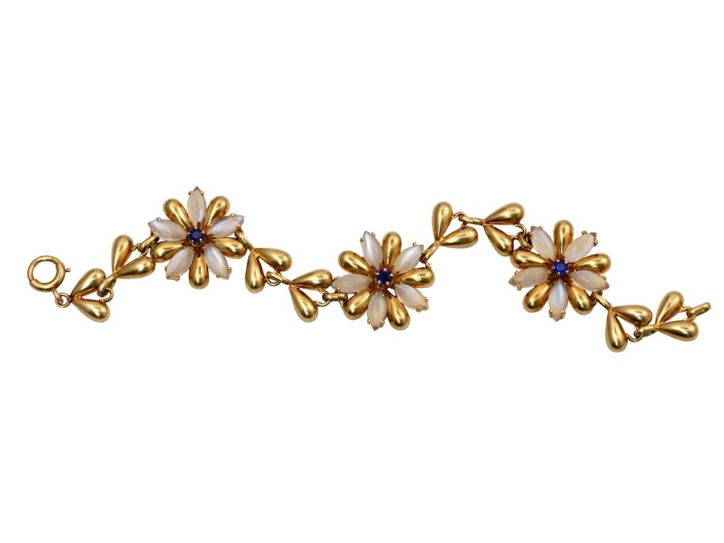 A beautiful and classic Tiffany & Co. Sapphire and Moonstone Flower Bracelet.