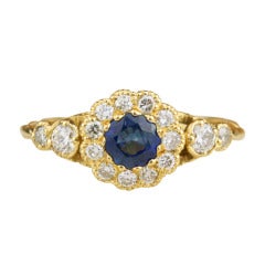 Sapphire, Diamond and Gold Halo Ring