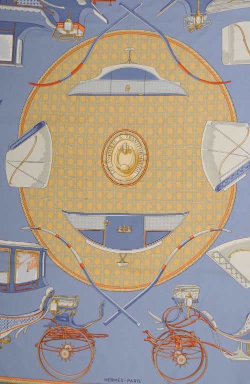 This beautiful blue silk scarf from Hermes depicts the many forms of horse drawn vehicles popular in the 19th century. It is in excellent condition.

Measurements
35