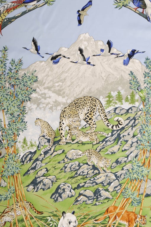 A truly stunning design by Robert Dallet, this scarf salutes the animals of China. A charming Panda Bear is eating bamboo while the Snow Leopard family looks on. It is from the estate of Lyn Revson, a memeber of the Interneational Best Dressed List,