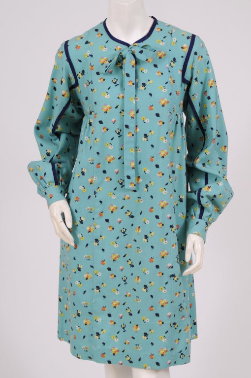 Famous for her Vidal Sassoon haircut and the popularization of mini skirts in the 1960's Mary Quant designed clothes for young women. This dress from the Ginger Group is a great example of her affordable, youthful style. A lightweight wool challis